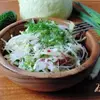 Салат  с огурцами и свежей капустой