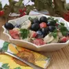 Картофельный салат с помидорами и оливками