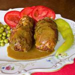 Свинина, фаршированная курагой и луком