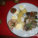 Сельдь в томатно-масляной заливке