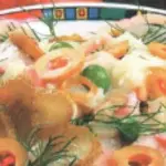 Салат из консервированных кальмаров