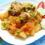 Картофель тушеный со свининой и капустой