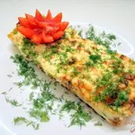 Хек запеченный с помидорами