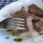 Тушеная свиная печень