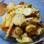 Острый картофель с тимьяном под сыром