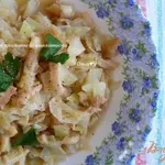 Кальмары, тушеные с капустой в белом вине