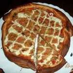 Пицца с жаренным луком