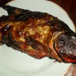 Линь запеченный в духовке с кетчупом