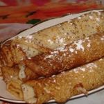 Венгерские маковые блины с изюмом, орехом и медом