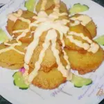 Картофель под морковным соусом