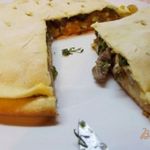 Пицца закрытая мясная с зеленью