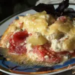Помидоры с кабачками в сырной заливке