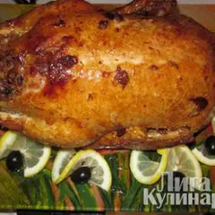 фото рецепта Утка запеченная, фаршированная гречкой с грибами