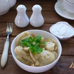 фото рецепта Вареники с капустой и отварным яйцом