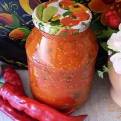 фото рецепта Горький перец в томате с чесноком и зеленью