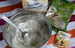 Отдельно смешать молотый фундук, муку, разрыхлитель,