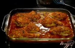 Выложить поверх каждой куриной ножки по 1 стол.л домашней приправы.Закрыть фольгой и поставить в разогретую духовку на 1 час.