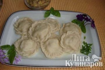 фото рецепта Равиоли с куриным фаршем и грибным соусом
