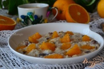 фото рецепта Овсяная каша с изюмом и кусочками апельсина