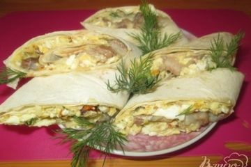 фото рецепта Рулет из лаваша с яйцом и сельдью