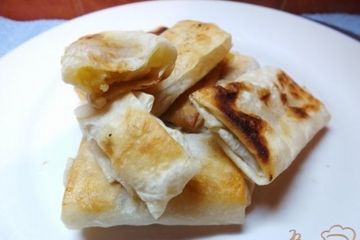 фото рецепта Пирожки жаренные из лаваша с яблоком и орехами