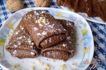 фото рецепта Шоколадные блинчики с начинкой запеченные в духовке