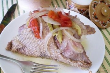 фото рецепта Утка тушенная с помидорами и чесноком