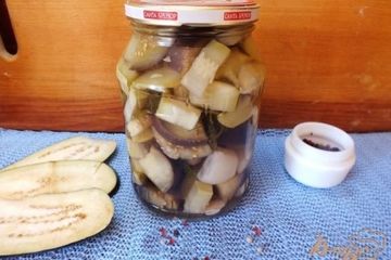 фото рецепта Консервированный салат из кабачков и баклажанов