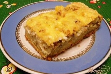 фото рецепта Быстрый пирог с консервами и рисом