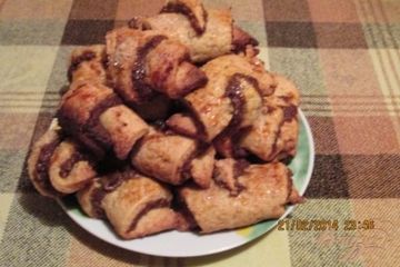 фото рецепта Рулетики с сушеными абрикосами и грецким орехом.