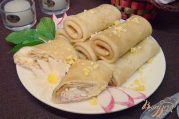 фото рецепта Блины фаршированные крабовыми палочками и яйцом
