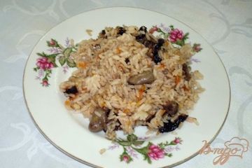 фото рецепта Паэлья с куриными сердечками и черносливом