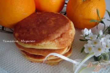 фото рецепта Апельсиновые оладьи с изюмом