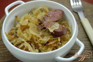 фото рецепта Кислая капуста, тушенная с колбасками и тмином