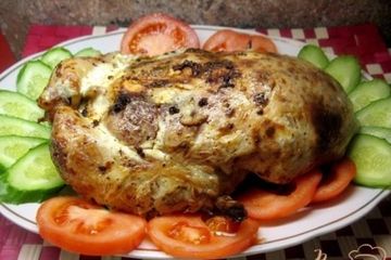 фото рецепта Фаршированная курица рисом с грибами.